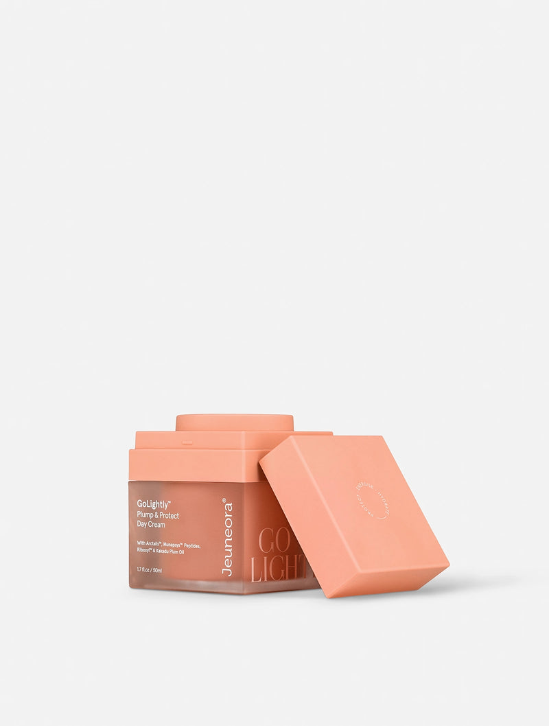 Jeuneora GoLightly Day Cream jar with the lid off, showing the cap and product
