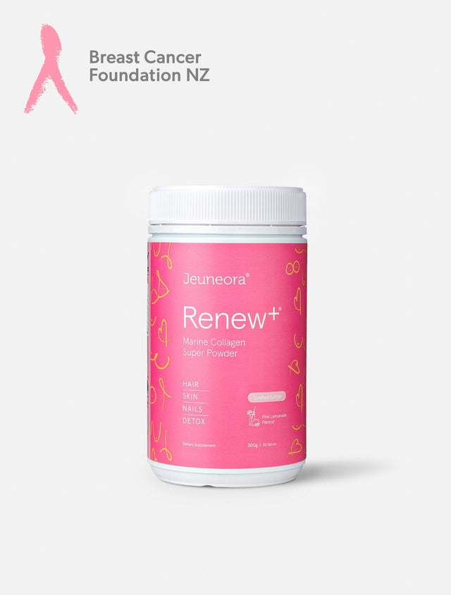 Pink Renew+™ Marine Collagen Super Powder set up with lemons on pink background