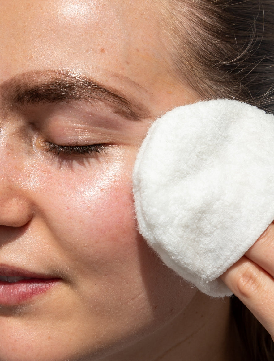 Woman removing eye makeup with MeltTheDay gentle gel cleanser